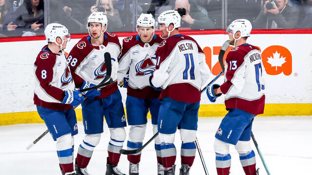 WINNIPEG, CANADA - MARCH 14: Cale Makar #8, Martin Necas #88, Nathan MacKinnon #29, Brock Nelson #11 and Valeri Nichushkin #13 of the Colorado Avalanche celebrate a third period goal against the Winnipeg Jets at the Canada Life Centre on March 14, 2026 in Winnipeg, Manitoba, Canada.
