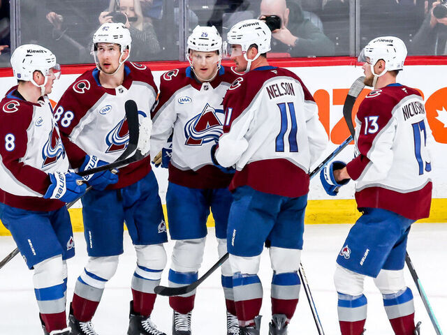 WINNIPEG, CANADA - MARCH 14: Cale Makar #8, Martin Necas #88, Nathan MacKinnon #29, Brock Nelson #11 and Valeri Nichushkin #13 of the Colorado Avalanche celebrate a third period goal against the Winnipeg Jets at the Canada Life Centre on March 14, 2026 in Winnipeg, Manitoba, Canada.