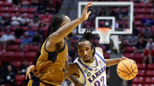 SAN DIEGO, CALIFORNIA - MARCH 20: Darryn Peterson #22 of the Kansas Jayhawks drives to the basket against Martel Williams #33 of the California Baptist Lancers during the second half of the game in the first round of the 2026 NCAA Men's Basketball Tournament at Viejas Arena at San Diego State University on March 20, 2026 in San Diego, California.