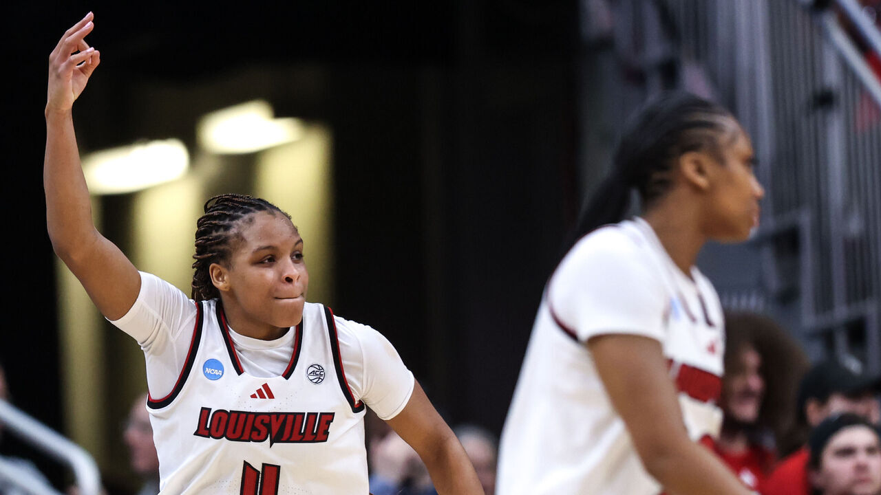 LOUISVILLE, KENTUCKY - MARCH 21: MacKenly Randolph #4 of the Louisville Cardinals reacts to making a three point shot against the Vermont Catamounts during a first round game of the 2026 NCAA Women's Basketball Tournament held at KFC YUM! Center on March 21, 2026 in Louisville, Kentucky.