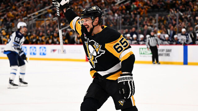 PITTSBURGH, PA - MARCH 21: Erik Karlsson #65 of the Pittsburgh Penguins celebrates his goal during the third period against the Winnipeg Jets at PPG PAINTS Arena on March 21, 2026 in Pittsburgh, Pennsylvania.