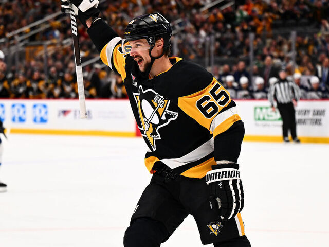 PITTSBURGH, PA - MARCH 21: Erik Karlsson #65 of the Pittsburgh Penguins celebrates his goal during the third period against the Winnipeg Jets at PPG PAINTS Arena on March 21, 2026 in Pittsburgh, Pennsylvania.
