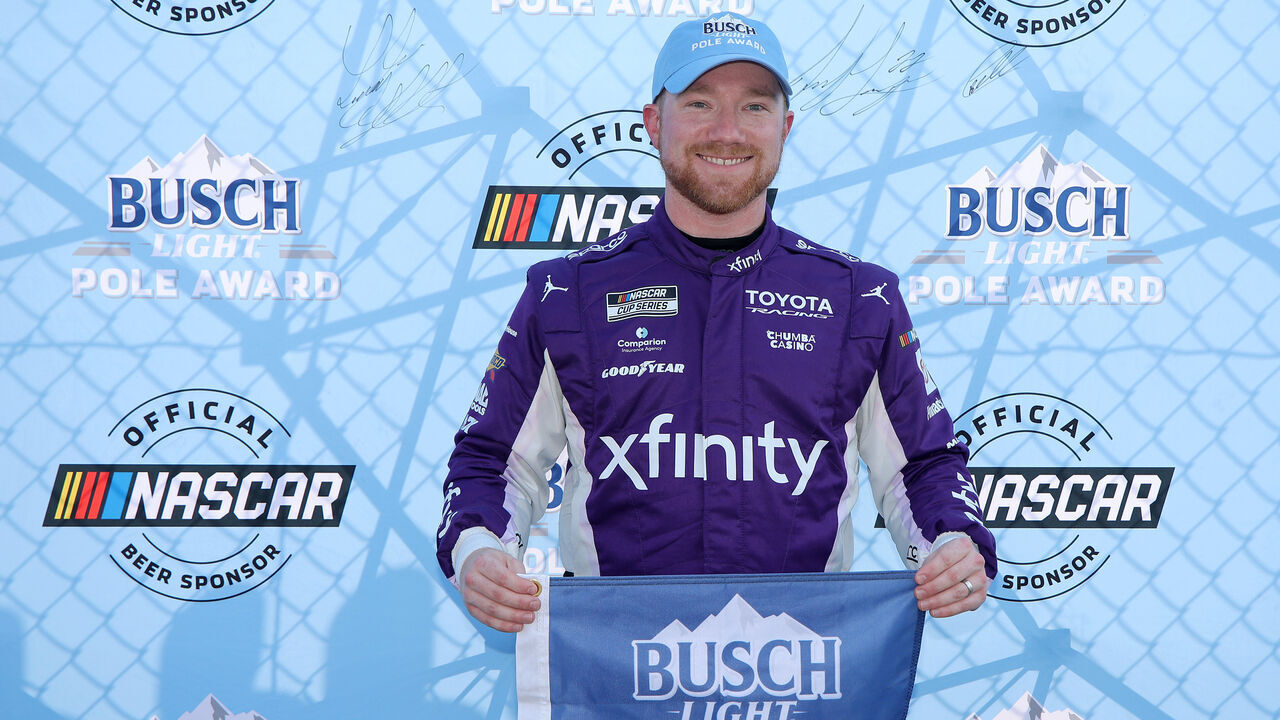 DARLINGTON, SOUTH CAROLINA - MARCH 21: Tyler Reddick, driver of the #45 Xfinity Toyota, poses for photos after winning the pole award during qualifying for the NASCAR Cup Series Goodyear 400 at Darlington Raceway on March 21, 2026 in Darlington, South Carolina.