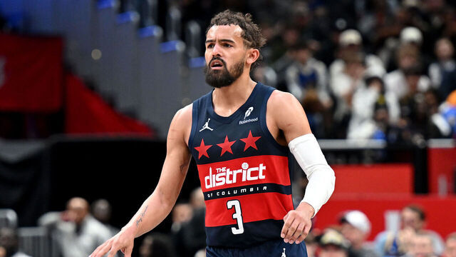 WASHINGTON, DC - MARCH 16: Trae Young #3 of the Washington Wizards handles the ball against the Golden State Warriors at Capital One Arena on March 16, 2026 in Washington, DC.