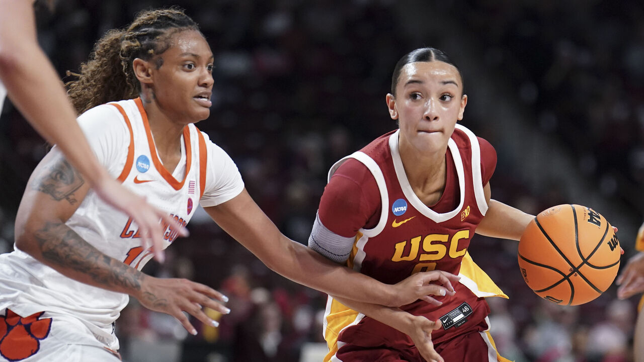 COLUMBIA, SOUTH CAROLINA - MARCH 21: Jazzy Davidson #9 of Southern California dribbles the ball against Rusne Augustinaite #11 of the Clemson Tigers during the second quarter of the first round NCAA Women's Basketball Tournament game at Colonial Life Arena on March 21, 2026 in Columbia, South Carolina.