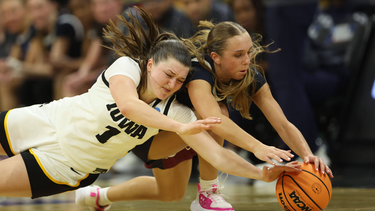 IOWA CITY, IOWA - MARCH 21:Taylor Stremlow #1 of the Iowa Hawkeyes battles Reese Downey #25 of the FDU Knights for a loose ball during a first round game of the 2026 NCAA Women's Basketball Tournament held at Carver-Hawkeye Arena on March 21, 2026 in Iowa City, Iowa.