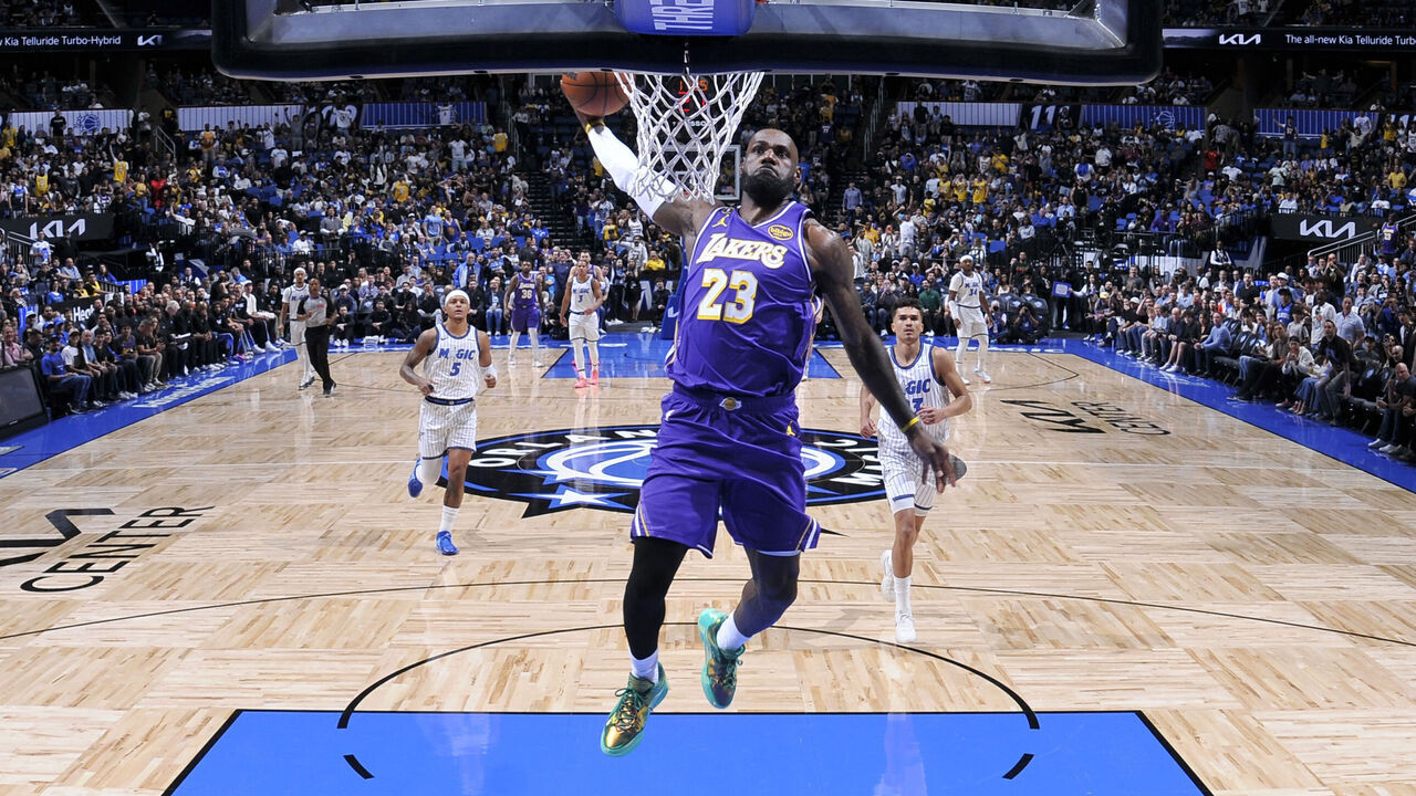 ORLANDO, FL - MARCH 21: LeBron James #23 of the Los Angeles Lakers dunks the ball during the game against the Orlando Magic on March 21, 2026 at Kia Center in Orlando, Florida. Mandatory Copyright Notice: Copyright 2026 NBAE