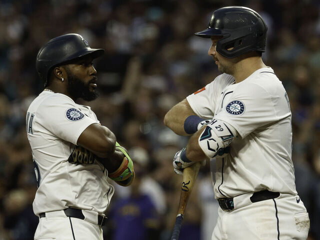 SEATTLE, WASHINGTON - SEPTEMBER 09: Randy Arozarena #56 of the Seattle Mariners celebrates with Cal Raleigh #29 after hitting a three-run home run during the third inning against the St. Louis Cardinals at T-Mobile Park on September 09, 2025 in Seattle, Washington.