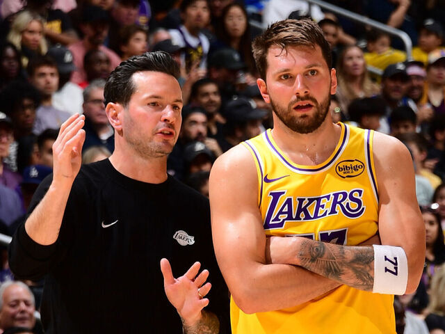 LOS ANGELES, CA - MARCH 12: Luka Doncic #77 and Head Coach JJ Redick of the Los Angeles Lakers talk during the game against the Chicago Bulls on March 12, 2026 at Crypto.Com Arena in Los Angeles, California. NOTE TO USER: User expressly acknowledges and agrees that, by downloading and/or using this Photograph, user is consenting to the terms and conditions of the Getty Images License Agreement. Mandatory Copyright Notice: Copyright 2026 NBAE