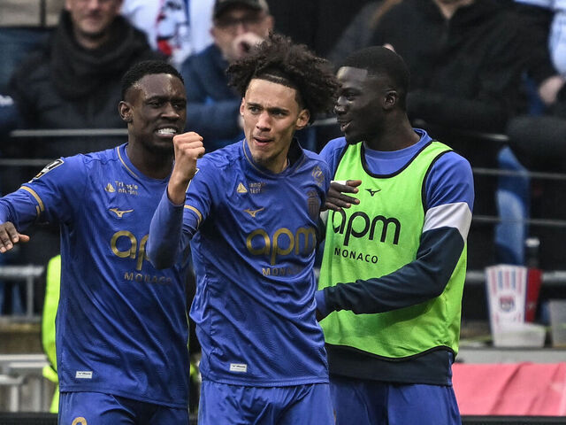 Monaco's French midfielder #11 Maghnes Akliouche (2ndL) celebrates with his teamates after scoring a goal during the French L1 football match between Olympique Lyonnais (OL) and AS Monaco (ASM) at the Groupama Stadium in Decines-Charpieu, central-eastern France on March 22, 2026.
