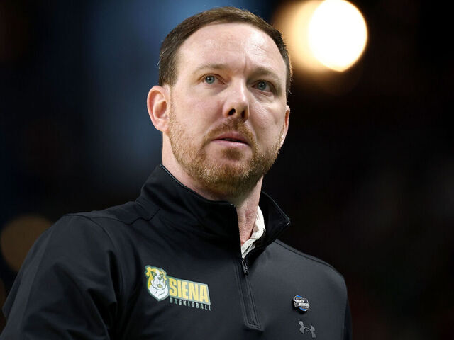 GREENVILLE, SOUTH CAROLINA - MARCH 19: Head coach Gerry McNamara of the Siena Saints looks on during the first half against the Duke Blue Devils in the first round of the 2026 NCAA Men's Basketball Tournament at Bon Secours Wellness Arena on March 19, 2026 in Greenville, South Carolina.