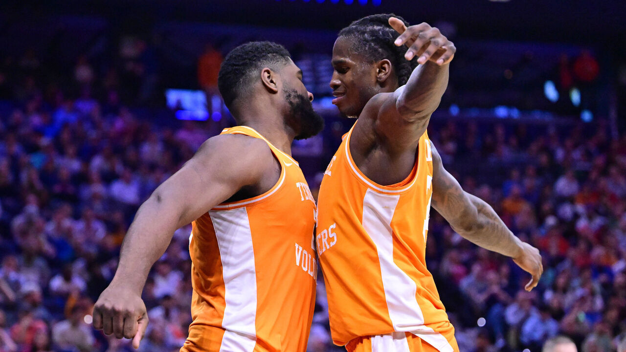 PHILADELPHIA, PENNSYLVANIA - MARCH 22: Jaylen Carey #23 celebrates with Felix Okpara #34 of the Tennessee Volunteers against the Virginia Cavaliers during the second half of the second round of the 2026 NCAA Men's Basketball Tournament held at Xfinity Mobile Arena on March 22, 2026 in Philadelphia, Pennsylvania.