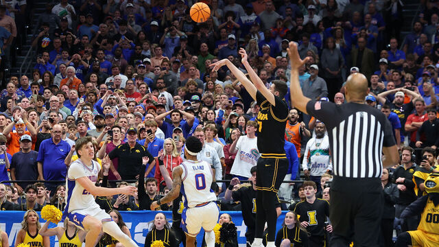 TAMPA, FLORIDA - MARCH 22: Alvaro Folgueiras #7 of the Iowa Hawkeyes attempts a three point basket against the Florida Gators with under five seconds left during the second half in the second round of the 2026 NCAA Men's Basketball Tournament at Benchmark International Arena on March 22, 2026 in Tampa, Florida.