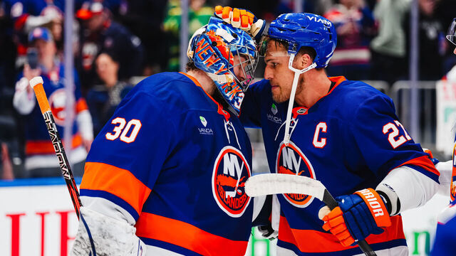 ELMONT, NEW YORK - MARCH 22: Anders Lee #27 and Ilya Sorokin #30 of the New York Islanders celebrate their 1-0 win against the Columbus Blue Jackets at UBS Arena on March 22, 2026 in Elmont, New York.