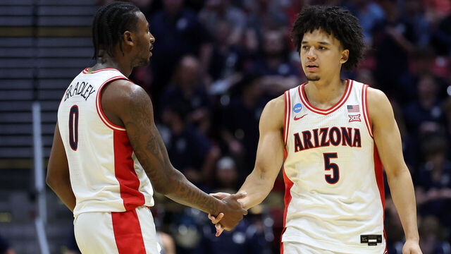 SAN DIEGO, CALIFORNIA - MARCH 22: Jaden Bradley #0 and Brayden Burries #5 of the Arizona Wildcats react during the second half against the Utah State Aggies in the second round of the 2026 NCAA Men's Basketball Tournament at Viejas Arena at San Diego State University on March 22, 2026 in San Diego, California.