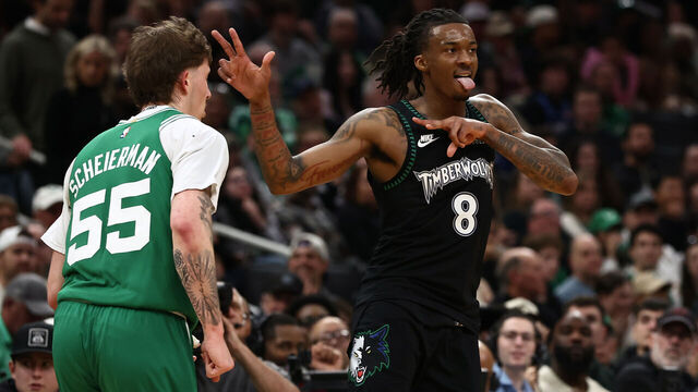 BOSTON, MA - MARCH 22: Bones Hyland #8 of the Minnesota Timberwolves celebrates after making a three-point basket as Baylor Scheierman #55 of the Boston Celtics runs by during the second half at TD Garden on March 22, 2026 in Boston, Massachusetts. NOTE TO USER: User expressly acknowledges and agrees that, by downloading and/or using this Photograph, user is consenting to the terms and conditions of the Getty Images License Agreement.