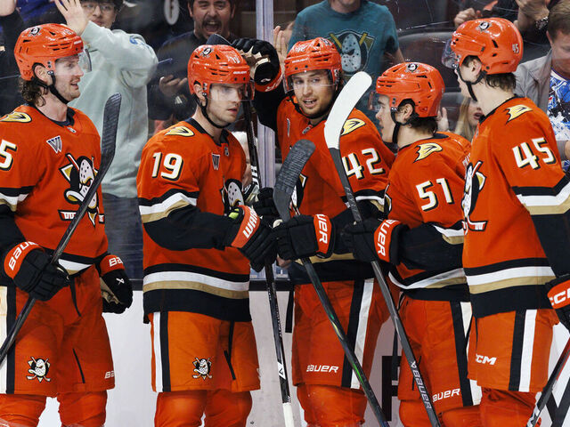 ANAHEIM, CALIFORNIA - MARCH 22: Troy Terry #19 of the Anaheim Ducks and Tim Washe #42 of the Anaheim Ducks celebrate a goal with teammates during the second period against the Buffalo Sabres at Honda Center on March 22, 2026 in Anaheim, California.