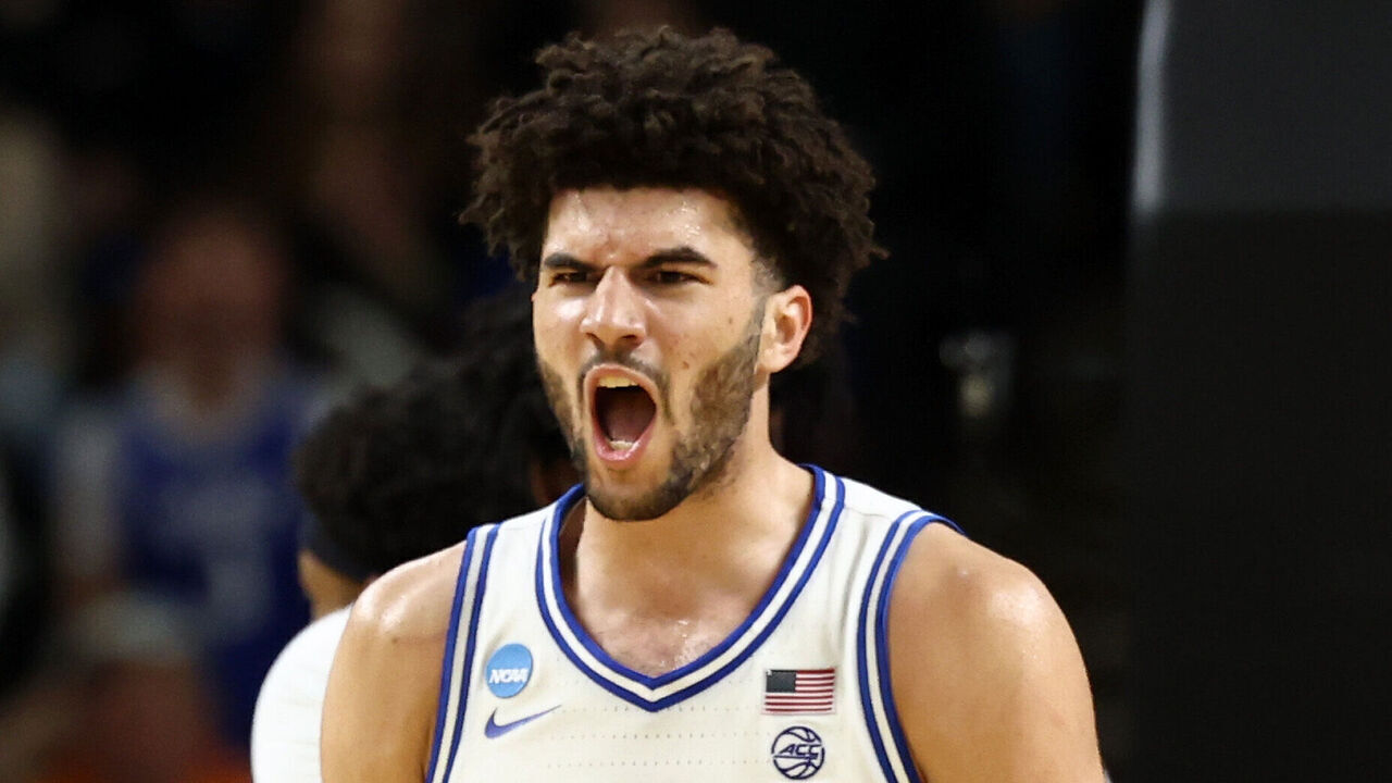 GREENVILLE, SOUTH CAROLINA - MARCH 21: Cameron Boozer #12 of the Duke Blue Devils reacts during the second half against the Texas Christian University Horned Frogs in the second round of the 2026 NCAA Men's Basketball Tournament at Bon Secours Wellness Arena on March 21, 2026 in Greenville, South Carolina.