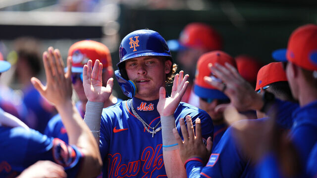 JUPITER, FLORIDA - FEBRUARY 27: Carson Benge #93 of the New York Mets celebrates after scoring against the St. Louis Cardinals during the first inning of a spring training gameat Roger Dean Stadium on February 27, 2026 in Jupiter, Florida.