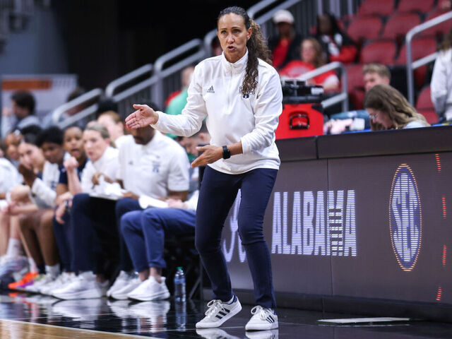 LOUISVILLE, KENTUCKY - MARCH 21: Tammi Reiss of the Rhode Island Rams yells towards her team in the third quarter of a game against the Alabama Crimson Tide during a first round game of the 2026 NCAA Women's Basketball Tournament held at KFC YUM! Center on March 21, 2026 in Louisville, Kentucky.