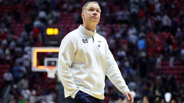 SAN DIEGO, CALIFORNIA - MARCH 22: Head coach Jerrod Calhoun of the Utah State Aggies walks off the court after the game against the Arizona Wildcats in the second round of the 2026 NCAA Men's Basketball Tournament at Viejas Arena at San Diego State University on March 22, 2026 in San Diego, California. The Wildcats defeated the Aggies 78-66.