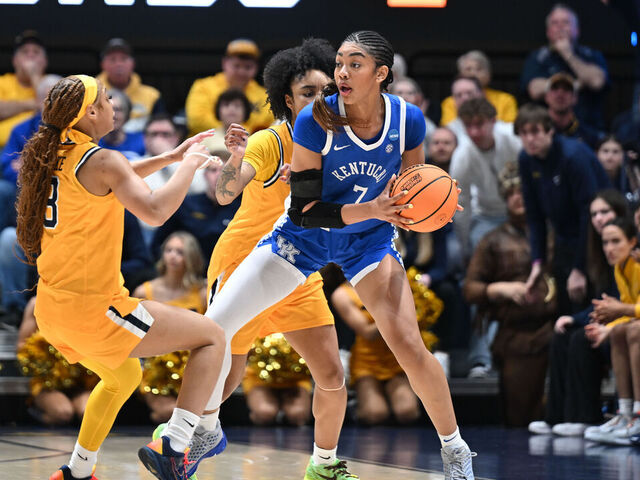MORGANTOWN, WEST VIRGINIA - MARCH 23: Gia Cooke #3 of the West Virginia Mountaineers defends Teonni Key #7 of the Kentucky Wildcats in the first half during a second round game of the 2026 NCAA Women's Basketball Tournament held at Hope Coliseum on March 23, 2026 in Morgantown, West Virginia.