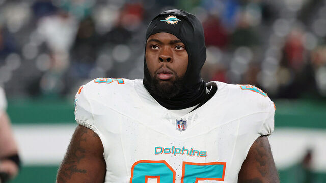 EAST RUTHERFORD, NEW JERSEY - JANUARY 5: Offensive Lineman Robert Jones #65 of the Miami Dolphins follows the action in the game between Dolphins vs the New York Jets at MetLife Stadium on January 5, 2025 in East Rutherford, New Jersey.