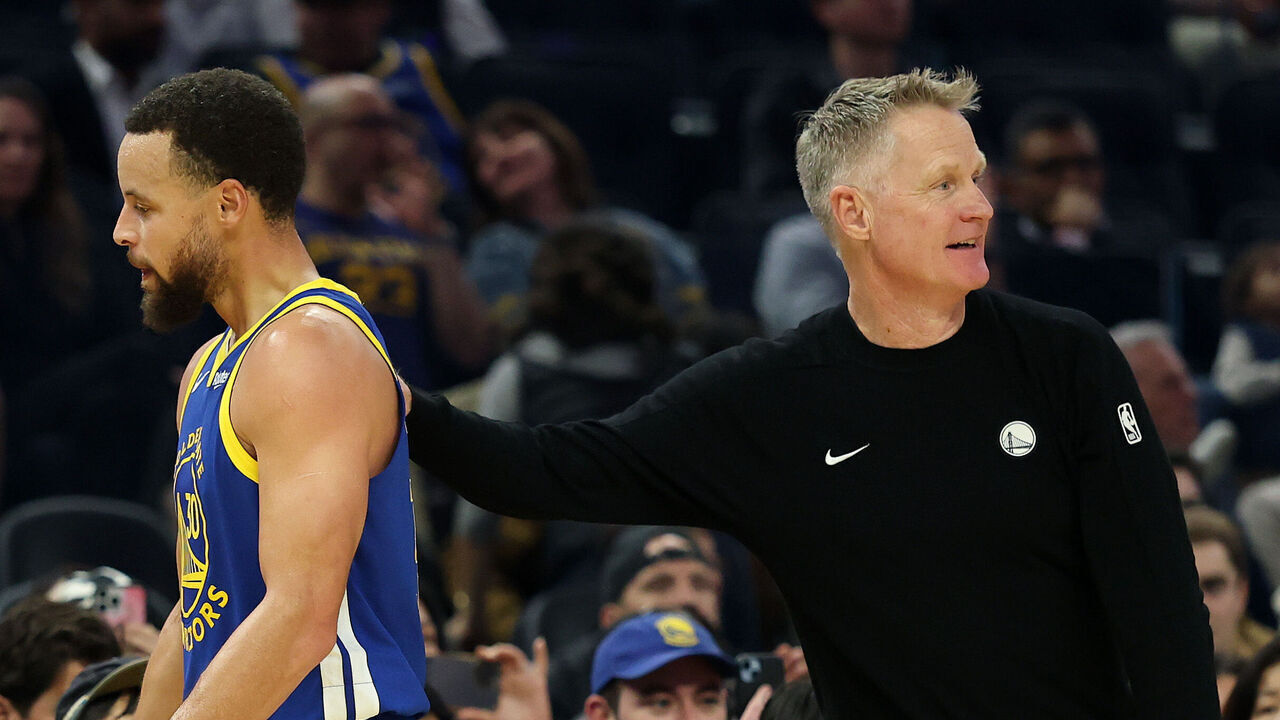 SAN FRANCISCO, CALIFORNIA - JANUARY 07: Head coach Steve Kerr of the Golden State Warriors talks to Stephen Curry #30 of the Golden State Warriors after he was taken out of their game against the Milwaukee Bucks during the first half at Chase Center on January 07, 2026 in San Francisco, California. NOTE TO USER: User expressly acknowledges and agrees that, by downloading and/or using this photograph, user is consenting to the terms and conditions of the Getty Images License Agreement.