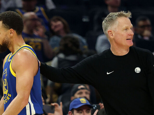 SAN FRANCISCO, CALIFORNIA - JANUARY 07: Head coach Steve Kerr of the Golden State Warriors talks to Stephen Curry #30 of the Golden State Warriors after he was taken out of their game against the Milwaukee Bucks during the first half at Chase Center on January 07, 2026 in San Francisco, California. NOTE TO USER: User expressly acknowledges and agrees that, by downloading and/or using this photograph, user is consenting to the terms and conditions of the Getty Images License Agreement.