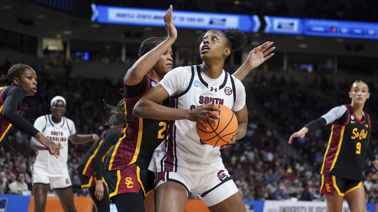COLUMBIA, SOUTH CAROLINA - MARCH 23: Joyce Edwards #8 of the South Carolina Gamecocks drives to the hoop against Kara Dunn #25 of the USC Trojans during the first quarter of a second round NCAA Women's Basketball Tournament game at Colonial Life Arena on March 23, 2026 in Columbia, South Carolina.