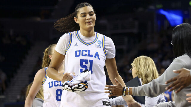 LOS ANGELES, CALIFORNIA - MARCH 21: Lauren Betts #51 of the UCLA Bruins high-fives teammates in the second half during the first round game of the 2026 NCAA Women’s Basketball Tournament against the California Baptist Lancers at UCLA Pauley Pavilion on March 21, 2026 in Los Angeles, California.