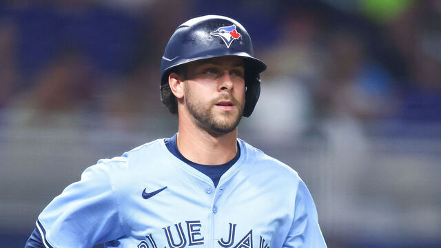 MIAMI, FLORIDA - AUGUST 22: Ernie Clement #22 of the Toronto Blue Jays at bat against the Miami Marlins in the fourth inning of the game at loanDepot park on August 22, 2025 in Miami, Florida.