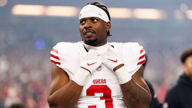 SEATTLE, WASHINGTON - JANUARY 17: Brian Robinson Jr. #3 of the San Francisco 49ers stands on the sidelines during the national anthem prior to an NFL divisional playoff football game against the Seattle Seahawks at Lumen Field on January 17, 2026 in Seattle, Washington.