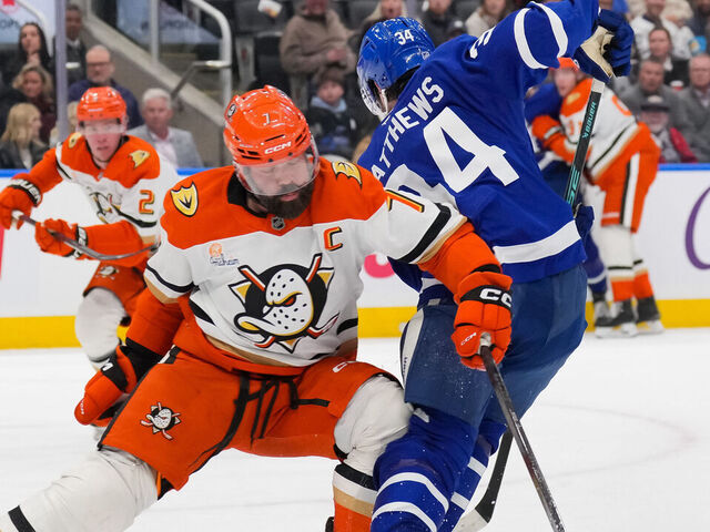 TORONTO, CANADA - MARCH 12: Radko Gudas #7 of the Anaheim Ducks takes a kneeing penalty against Auston Matthews #34 of the Toronto Maple Leafs in the second period at Scotiabank Arena on March 12, 2026 in Toronto, Ontario, Canada.