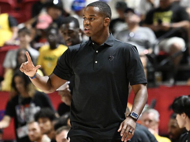 LAS VEGAS, NEVADA - JULY 17: Summer League head coach Ronald Nored of the Atlanta Hawks gestures to players on the court against the Los Angeles Lakers in the first half of a 2024 NBA Summer League game at the Thomas & Mack Center on July 17, 2024 in Las Vegas, Nevada. The Lakers defeated the Hawks 87-86.