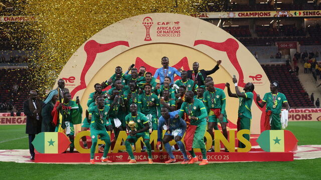 RABAT, MOROCCO - JANUARY 19: Senegalese players raise the trophy after winning the 35th Africa Cup of Nations (AFCON 2025) final match against Morocco at the Prince Moulay Abdellah Stadium in the capital Rabat, Morocco on January 19, 2026. Senegal won the 35th Africa Cup of Nations title on Sunday, defeating hosts Morocco 1-0 after extra time in a dramatic final marked by lengthy stoppage-time scenes.