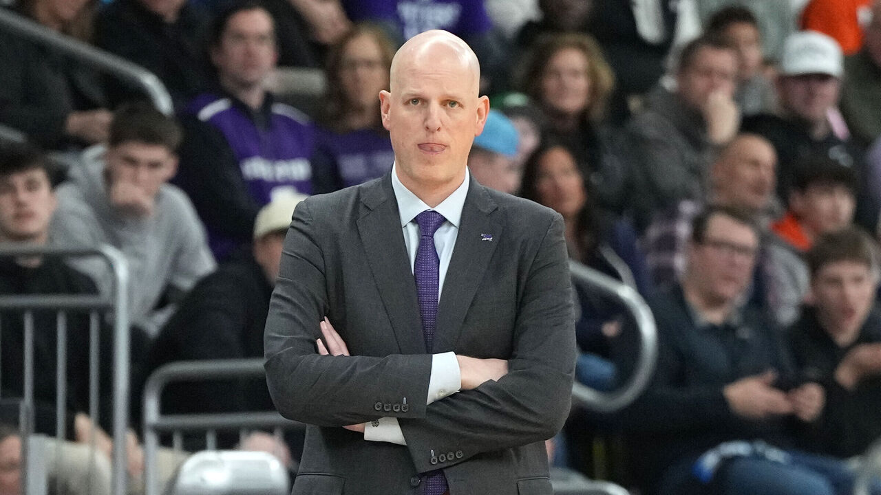 PROVIDENCE, RHODE ISLAND - MARCH 20: Head coach Alan Huss of the High Point Panthers looks on dribbles up court during a first-round game against the Purdue Boilermakers in the NCAA Men's Basketball Tournament at Amica Mutual Pavillion on March 20, 2025 in Providence, Rhode Island.