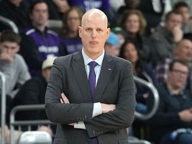 PROVIDENCE, RHODE ISLAND - MARCH 20: Head coach Alan Huss of the High Point Panthers looks on dribbles up court during a first-round game against the Purdue Boilermakers in the NCAA Men's Basketball Tournament at Amica Mutual Pavillion on March 20, 2025 in Providence, Rhode Island.