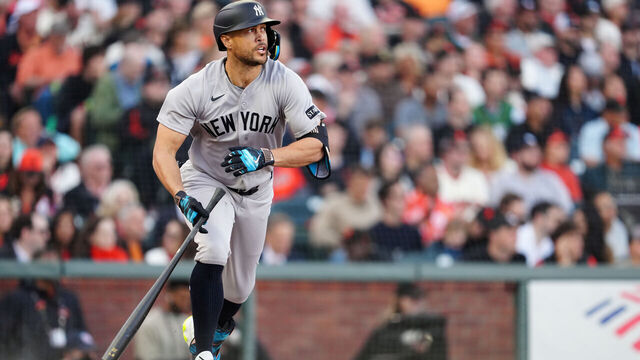 SAN FRANCISCO, CA - MARCH 25: Giancarlo Stanton #27 of the New York Yankees drops his bat to run after hitting a single in the second inning during the game between the New York Yankees and the San Francisco Giants at Oracle Park on Wednesday, March 25, 2026 in San Francisco, California.