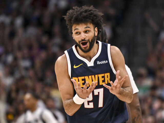 DENVER , CO - MARCH 25: Jamal Murray (27) of the Denver Nuggets celebrates after making a tough shot against the Dallas Mavericks during the third quarter at Ball Arena in Denver, Colorado on Wednesday, March 25, 2026.
