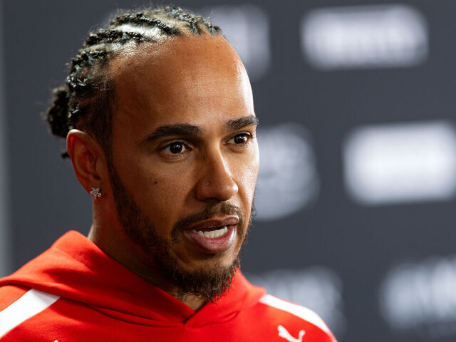 SUZUKA, JAPAN - MARCH 26: Lewis Hamilton of Great Britain and Scuderia Ferrari talks to the media during previews ahead of the F1 Grand Prix of Japan at Suzuka Circuit on March 26, 2026 in Suzuka, Japan.