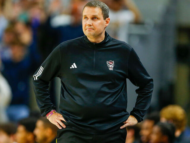 AUBURN, ALABAMA - DECEMBER 3: Will Wade head coach of the NC State Wolfpack watches play during the first half against the Auburn Tigers at Neville Arena on December 3, 2025 in Auburn, Alabama.