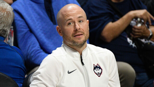 UNCASVILLE, CT - OCTOBER 13: UConn Huskies assistant coach Luke Murray looks on during the Naismith Basketball Hall of Fame exhibition college basketball game between the UConn Huskies and the Boston College Eagles on October 13, 2025, at Mohegan Sun Arena in Uncasville, CT.