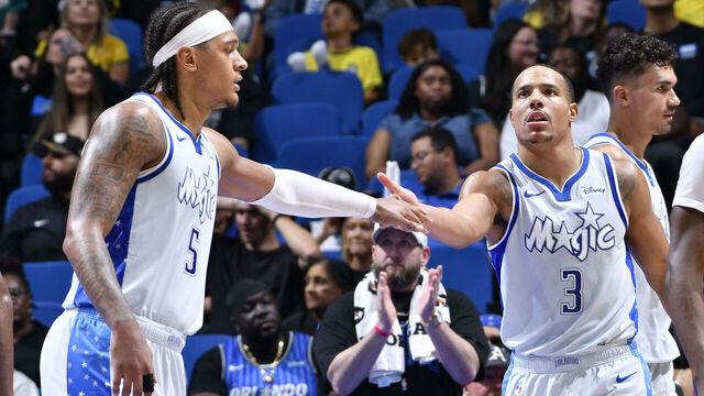 ORLANDO, FL - MARCH 26: Paolo Banchero #5 of the Orlando Magic and Desmond Bane #3 of the Orlando Magic high five during the game against the Sacramento Kings on March 26, 2026 at Kia Center in Orlando, Florida. Mandatory Copyright Notice: Copyright 2026 NBAE