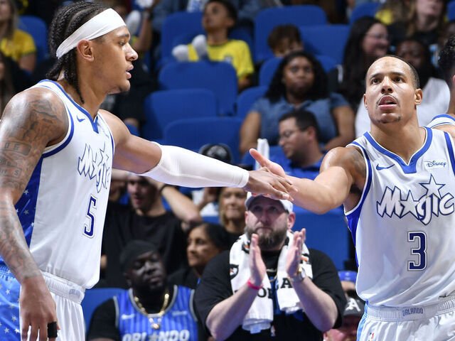 ORLANDO, FL - MARCH 26: Paolo Banchero #5 of the Orlando Magic and Desmond Bane #3 of the Orlando Magic high five during the game against the Sacramento Kings on March 26, 2026 at Kia Center in Orlando, Florida. Mandatory Copyright Notice: Copyright 2026 NBAE
