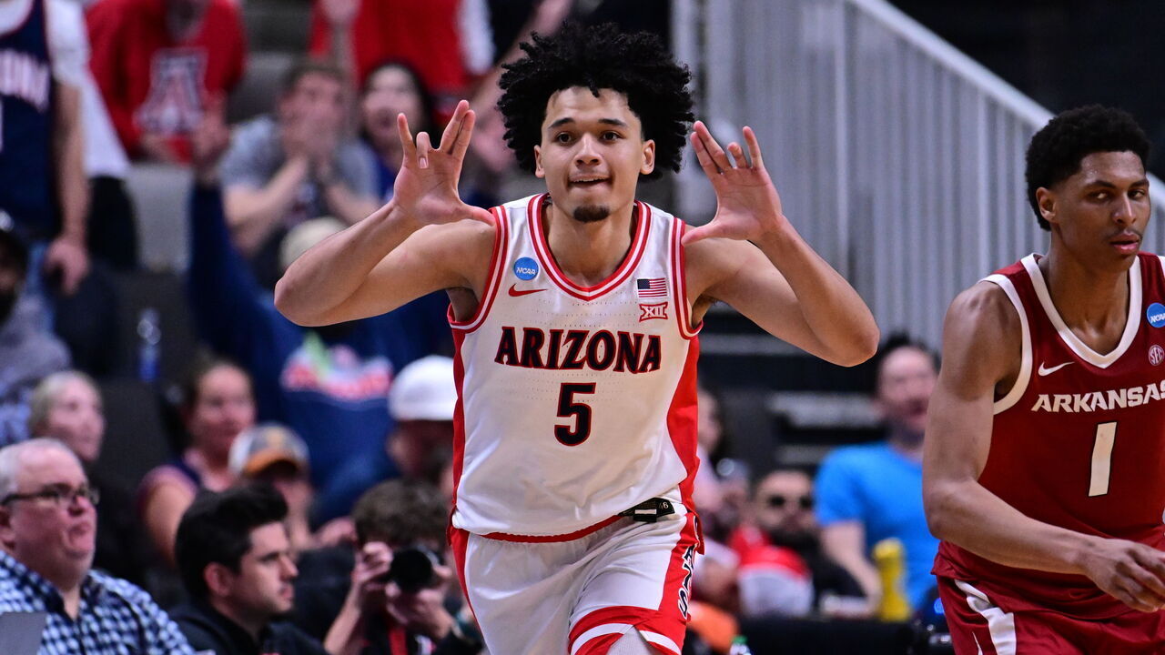 SAN JOSE, CALIFORNIA - MARCH 26: Brayden Burries #5 of the Arizona Wildcats celebrates against the Arkansas Razorbacks during the Sweet Sixteen round game of the 2026 NCAA Men's Basketball Tournament held at SAP Center on March 26, 2026 in San Jose, California.
