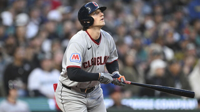 SEATTLE, WA - MARCH 26: Chase DeLauter #24 of the Cleveland Guardians hits a home run in the top of the first inning during the game between the Cleveland Guardians and the Seattle Mariners at T-Mobile Park on Thursday, March 26, 2026 in Seattle, Washington.