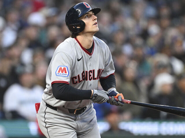 SEATTLE, WA - MARCH 26: Chase DeLauter #24 of the Cleveland Guardians hits a home run in the top of the first inning during the game between the Cleveland Guardians and the Seattle Mariners at T-Mobile Park on Thursday, March 26, 2026 in Seattle, Washington.