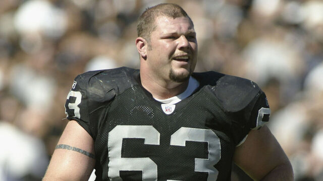OAKLAND, CA - SEPTEMBER 8: Center Barret Robbins #63 of the Oakland Raiders walks on the field during the game against the Seattle Seahawks on September 8, 2002 at Network Associates Coliseum in Oakland, California. The Raiders won 31-17.