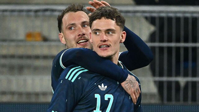 Germany's midfielder #17 Florian Wirtz celebrates scoring his team's third goal with Germany's defender #22 David Raum during the international friendly football match between Switzerland and Germany at St. Jakob-Park in Basel, Switzerland on March 27, 2026.